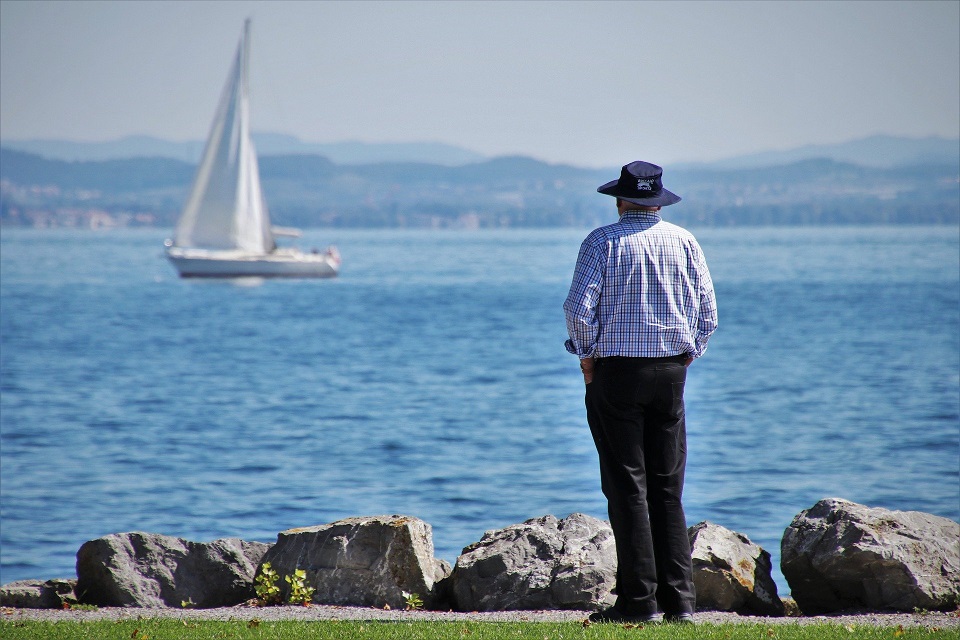 Retirement - Man Looking at Sailboat - Large.jpg